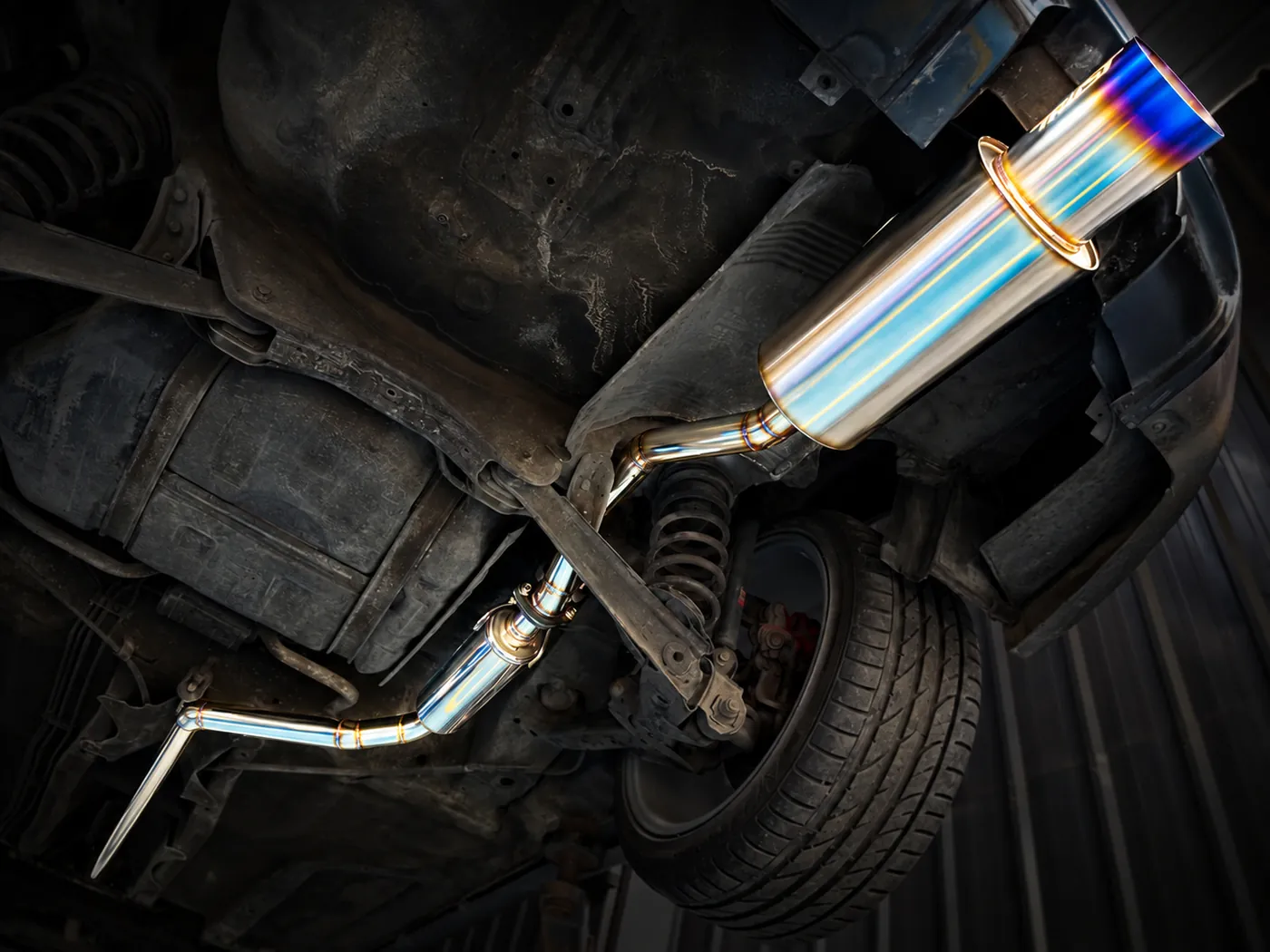 Catback exhaust with a burnt-titanium muffler tip on a Honda Civic FD