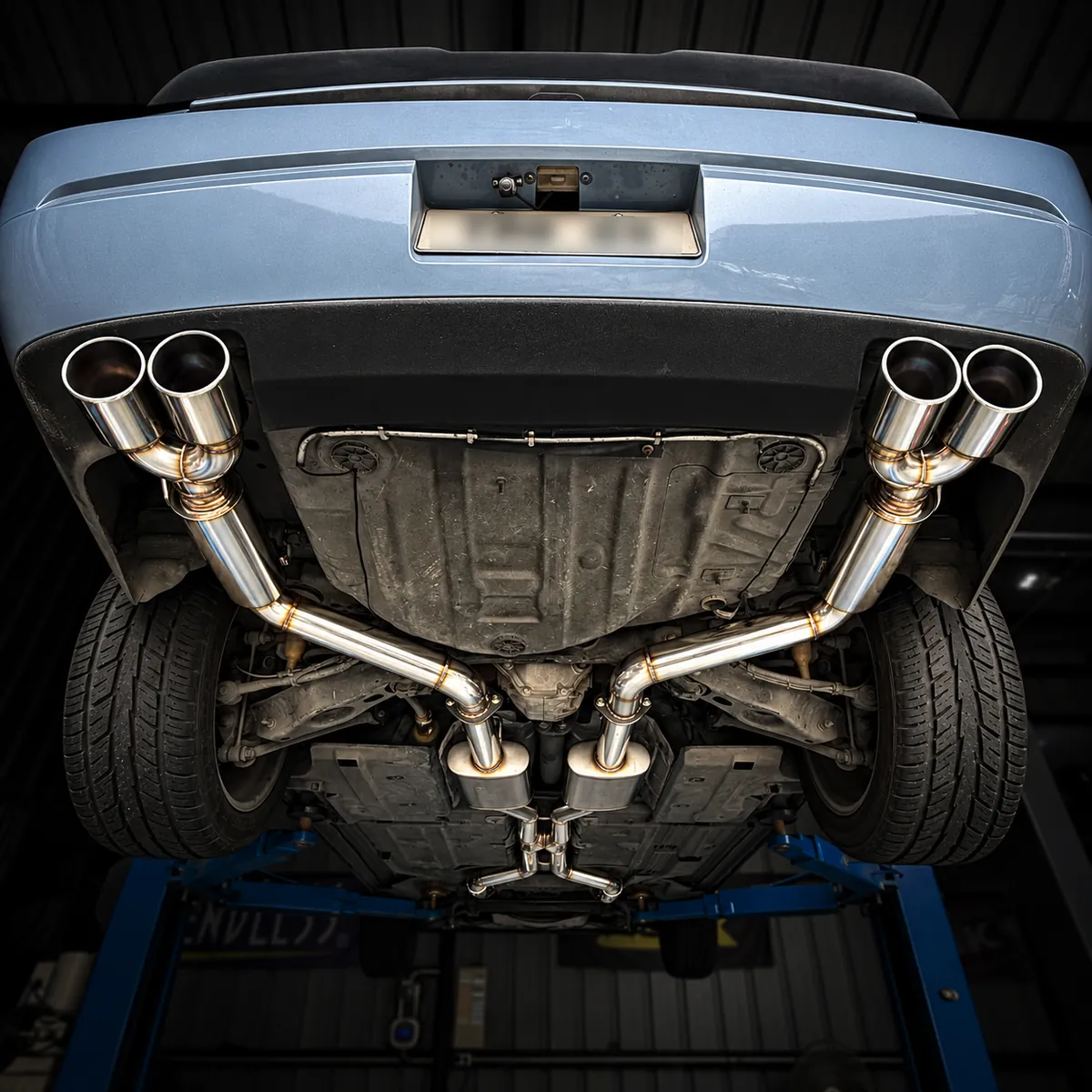 Full dual exhaust with two headers and downpipes on a Dodge Challenger