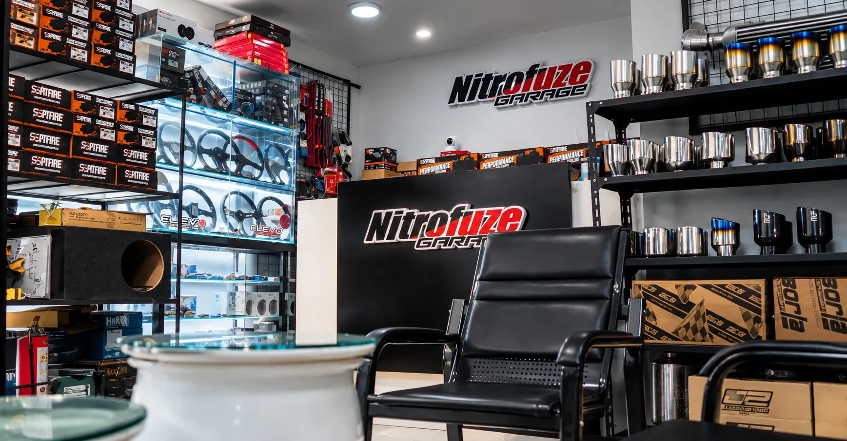 Showroom corner with the Nitrofuze Garage sign